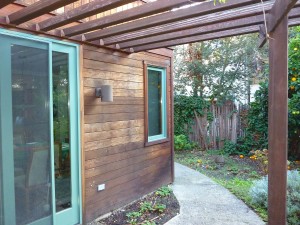 Redwood house with old stain