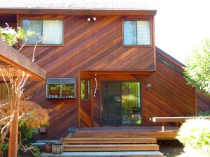 Redwood walls after cleaning and treating