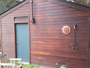 Redwood siding before cleaning