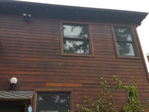 Redwood siding before cleaning