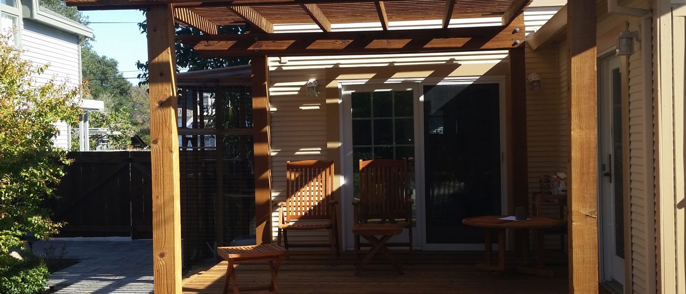 Redwood deck and trellis after restoration
