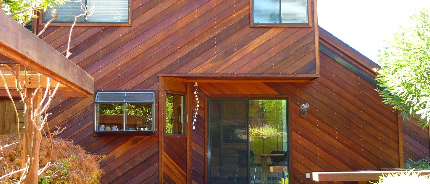 Redwood walls after cleaning and treating